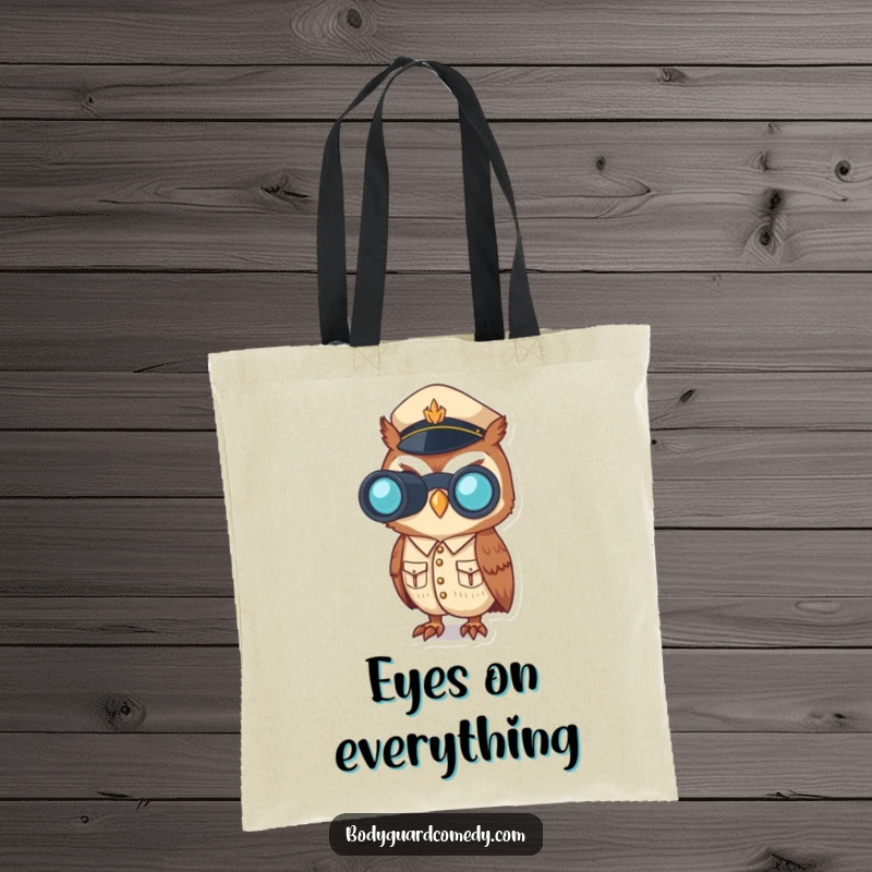 Funny tote bag featuring a vigilant owl in a sharp uniform, peering through binoculars, ideal for carrying daily necessities with humor.