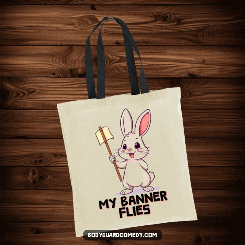 Funny tote bag featuring a brave rabbit holding a miniature banner with a bold posture, ideal for carrying items with energy.